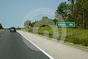 402 Highway Sign Indicating The Distance To Sarnia, Ontario photo