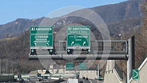 highway sign with the signs of the junction to go to Florence on photo