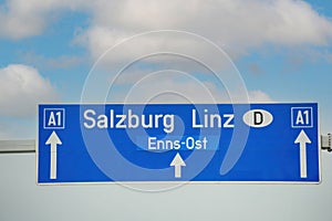 Highway signage with directions to Salzburg, Linz and Enns-Ost on the A1 highway