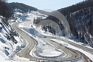 Highway among snow mountain , Belokurikha, Altai, Russia