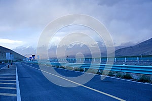 Highway and snow mountain