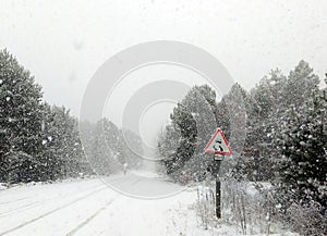 Highway Snow Road - Sudden and heavy snowfall on a thoroughfare Driving on it becomes dangerous photo