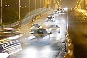 Highway speeding car at night