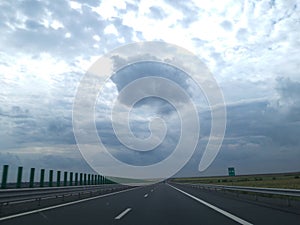 Highway and storm sky
