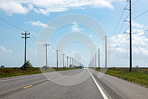 highway in texas with wooden eletrical pylons at the side, Texas, Willie photo