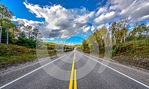 Highway to anywhere - bright summer day on country roads.