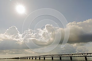 Highway to Key West Florida. View of old abandoned bridge and coast line of Atlantic ocean on blue sky.