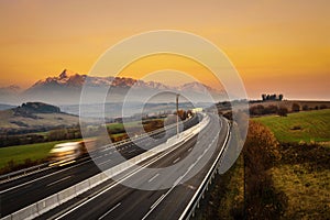 Highway with a truck under High Tatras in Slovakia