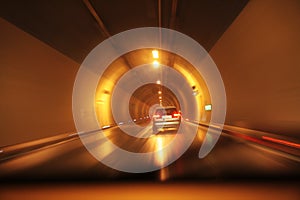 Highway tunnel at night . Motion blur