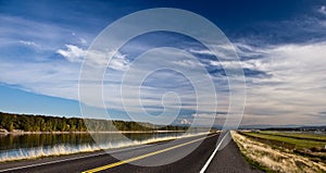 Highway under cloudscape