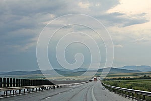 Highway under dark sky - after rain