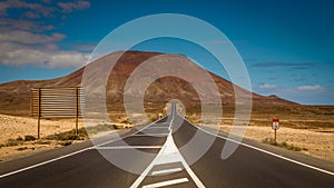 Highway through volcanic landscape