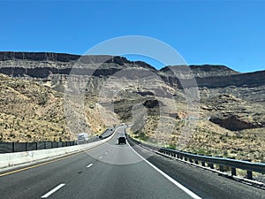 Highway winding through plateaus in arizona photo