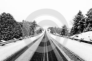 Highway in winter with guardrails