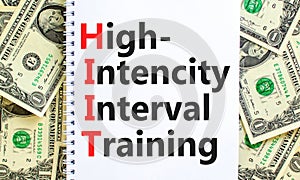 HIIT high-intensity interval training symbol. Concept words HIIT high-intensity interval training on note on a beautiful white
