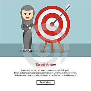 Hijab enterpreneur with arrow target photo