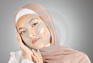 Hijab, skincare cream and muslim woman with natural beauty, face lotion and skin wellness treatment. Portrait of a model