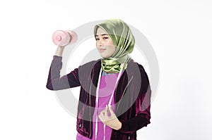 Hijab woman and dumbells for promoting a healthy fitness and lifestyle concept