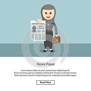 Hijabi enterpreneur holding a news paper