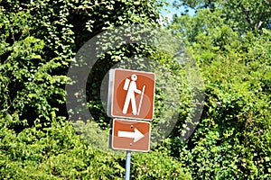 Hike trail signage leads to path