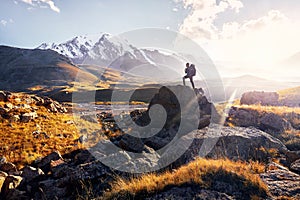 Hiker with big backpack in the mountains