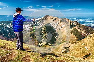 Hiker boy on top of the hill in Little Fatra mountains in Slovakia