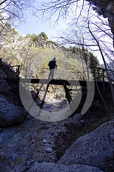 Hiker on bridge