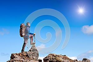 Hiker celebrates on the summit