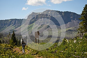 Hiker On Colorado Flattops Mountain Trail By Trappers Lake photo