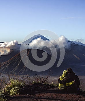 Hiker Couple Watches Sunrise over Mount Bromo, Java, Indonesia