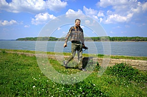 Hiker on Danube river shore