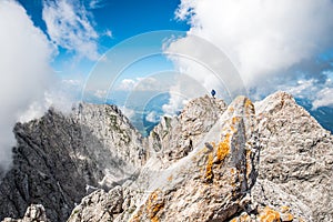 Hiker at Ellmauer Halt, Wilder Kaiser mountains of Austria - close to Gruttenhuette, Going, Tyrol, Austria - Hiking in the Alps of