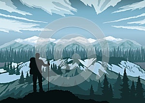 Hiker enjoying landscape with mountains, forest and sky. Mountain Peaks. photo
