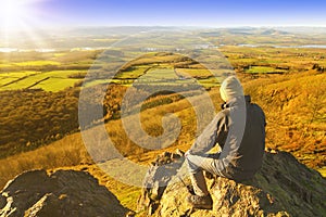 Hiker enjoying rest and landscape photo