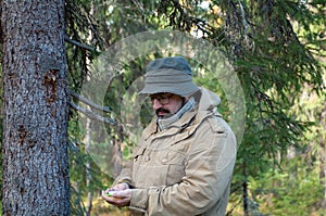 Hiker in forest .