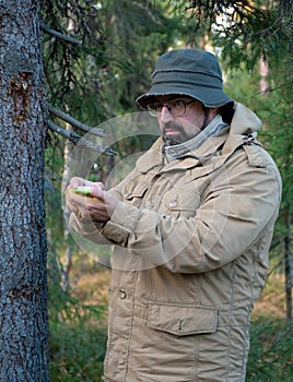 Hiker in forest .