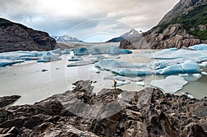 Hiker in front Grey Glacier in the Southern Patagonian Ice Field, Chile