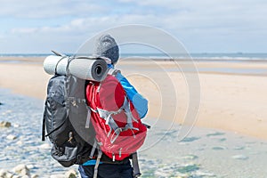 Hiker in front of the sea