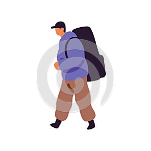 Hiker goes to travel with big haversack. Traveler carries huge backpack side view. Tourist in cap walks in hike. Person photo