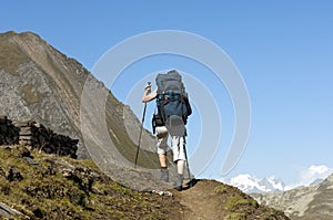 Hiker with a heavy backpack