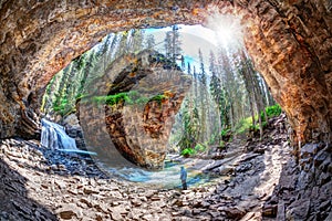 Hiker at Johnston Canyon Cave in Banff National Park Canada