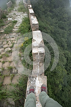 Hiker legs on the top of great wall