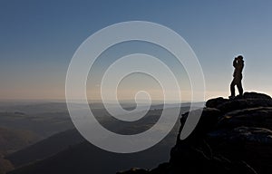 Hiker looking out over Dartmoor