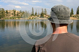 Hiker looking out over lake
