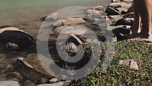 Hiker man rest at mountain lake