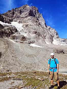 Hiker with Monte Cervino - Matterhorn Peak in the background