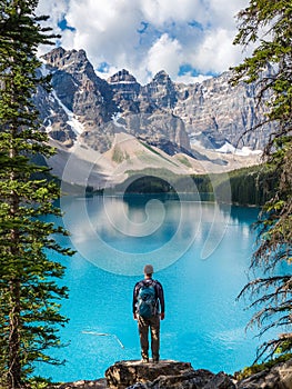 Hiker at Moraine Lake in Banff National Park, Canadian Rockies, Alberta, Canada photo