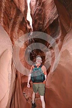 Hiker in narrow canyon