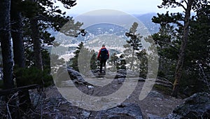 Hiker at overlook on Twin Sisters trail