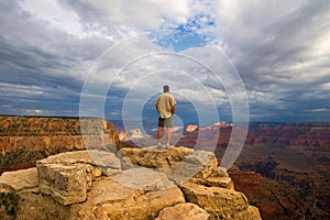 Hiker on Peak in Grand Canyon